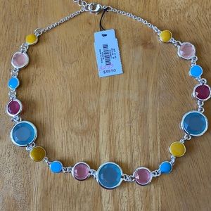 Costume jewelry.  Silver tone with spring-bright faceted and solid stones.
